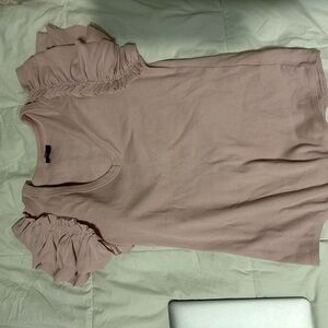 light pink bodysuit with ruffled sleeves